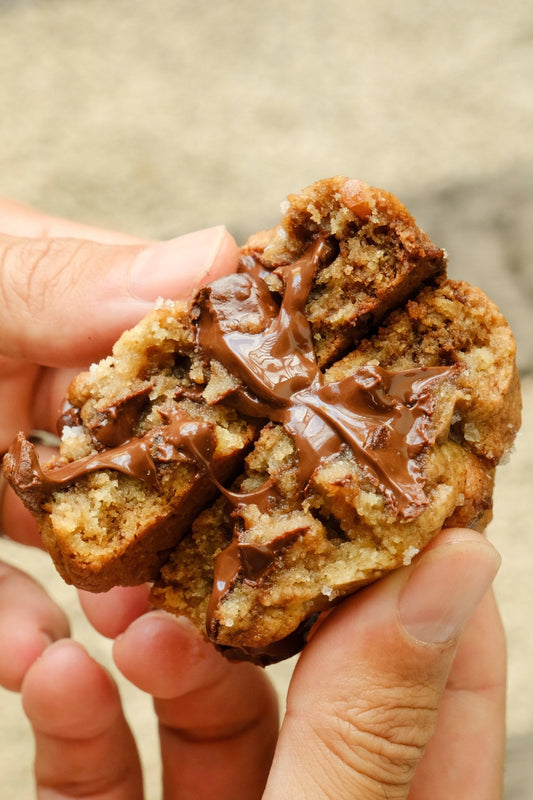 Tontie's Cookies signature chocolate chip cookie with golden-brown edges and melty chocolate chunks